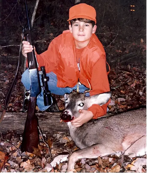 A picture of Adam and his first buck.